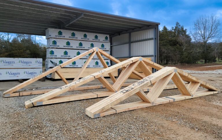 sets of wood trusses ready for delivery